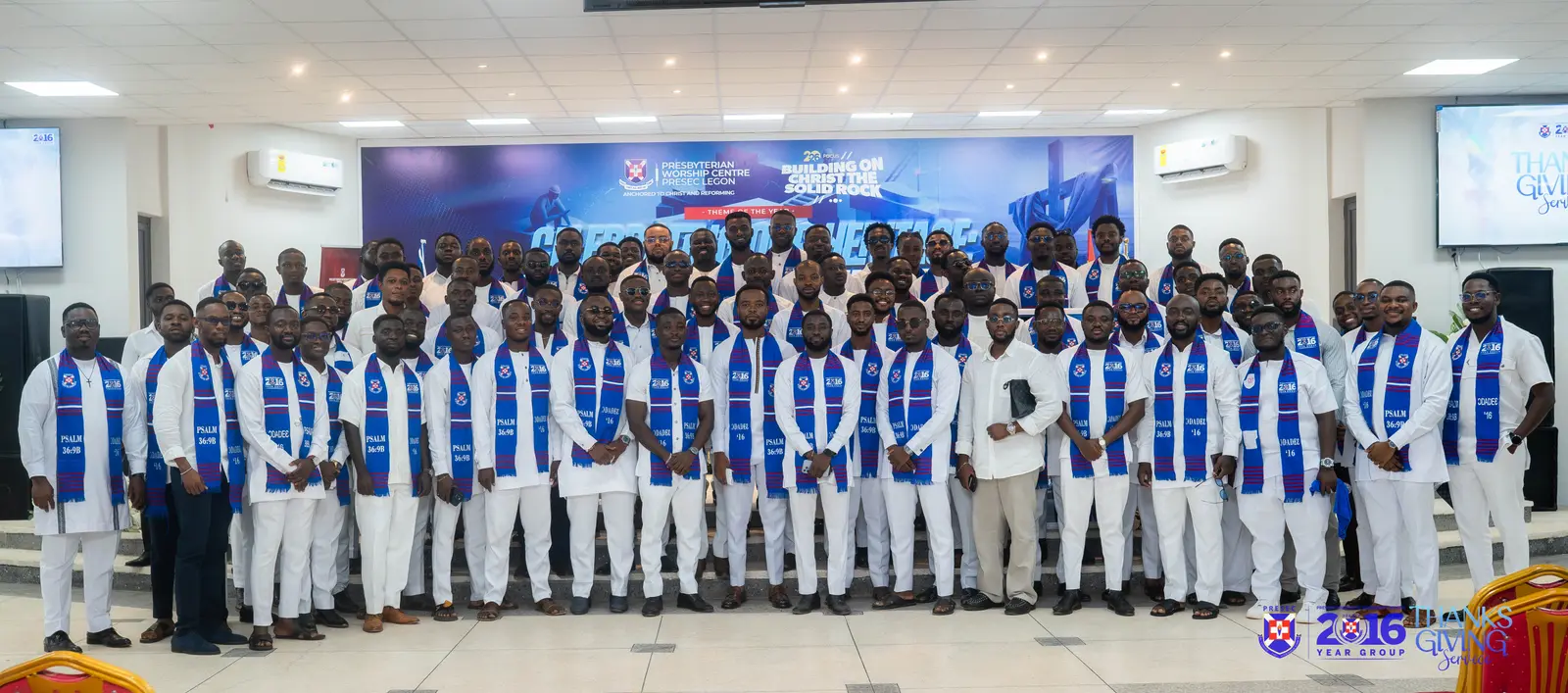 The whole year group in white with blue stoles at the Thanksgiving Service
